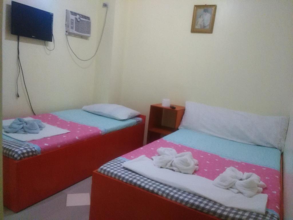 Aranas-Carillo Travellers Inn Kalibo Kamer foto