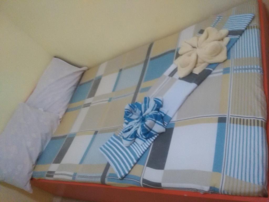 Aranas-Carillo Travellers Inn Kalibo Kamer foto