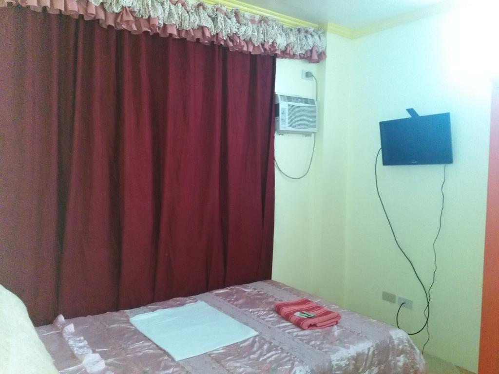 Aranas-Carillo Travellers Inn Kalibo Kamer foto