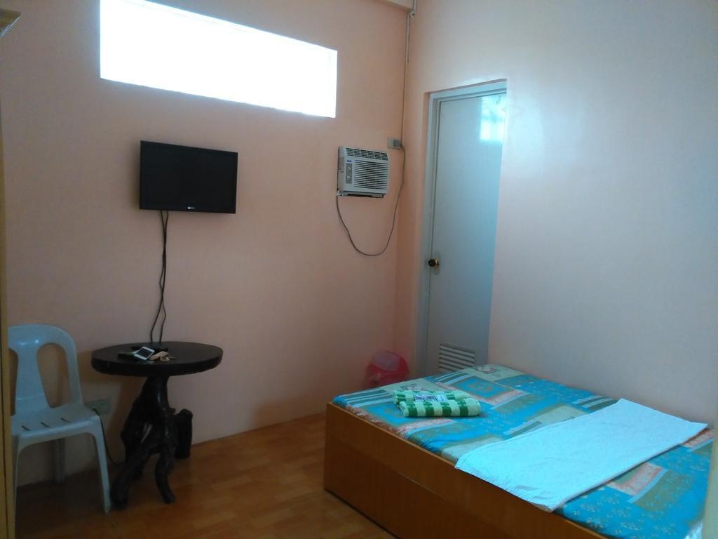 Aranas-Carillo Travellers Inn Kalibo Kamer foto